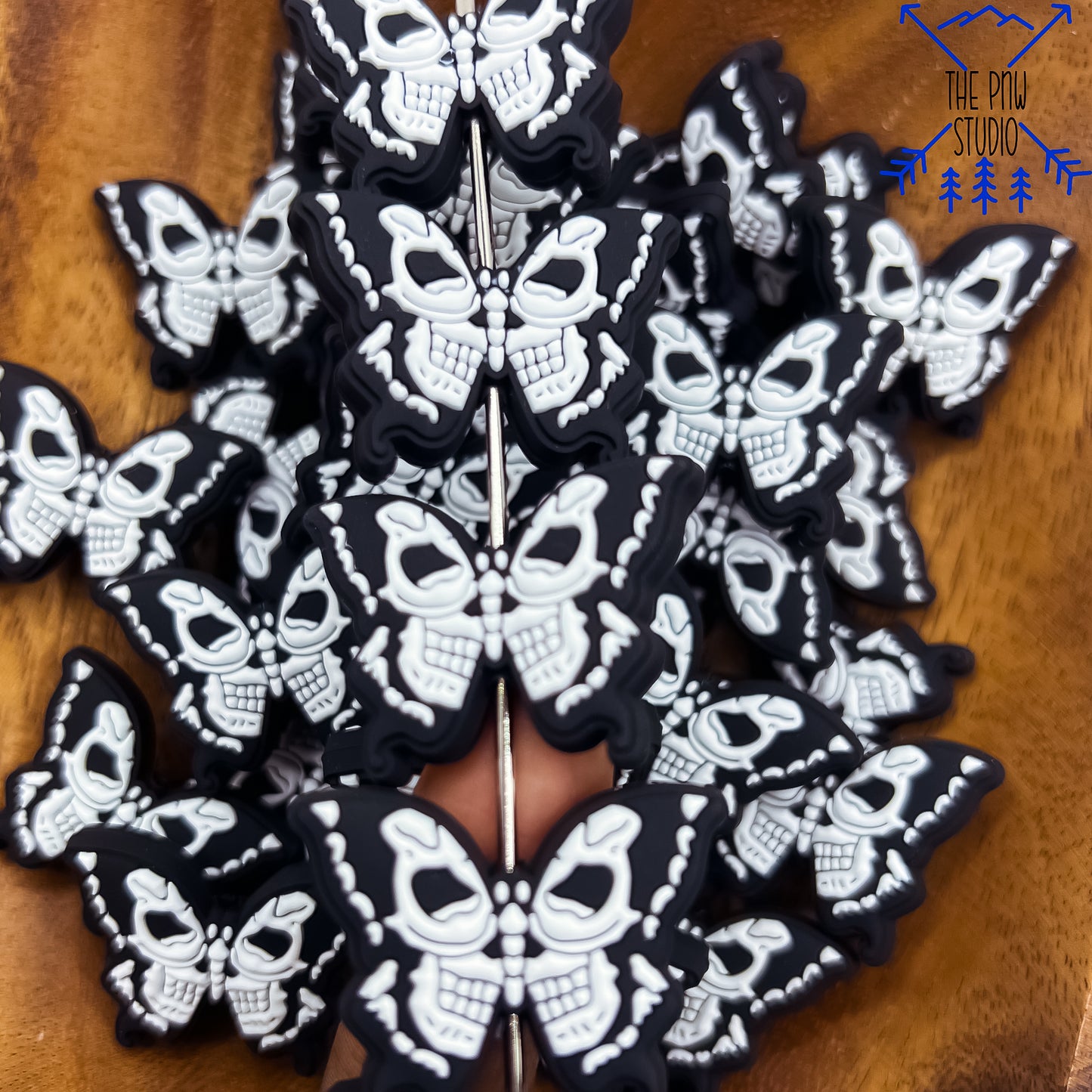 Butterfly skull focal bead