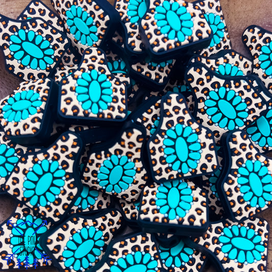 Turquoise and animal print cow tag