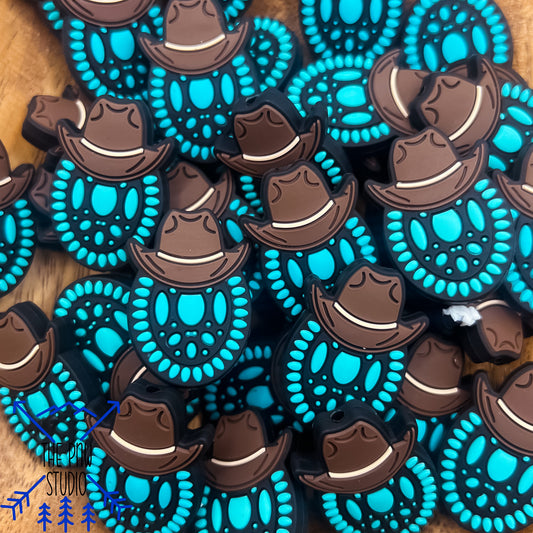 Turquoise in cowboy hat focal